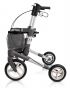 Image of the TOPRO Olympos ATR rollator, silver coloured in size medium. Viewed from the left side.